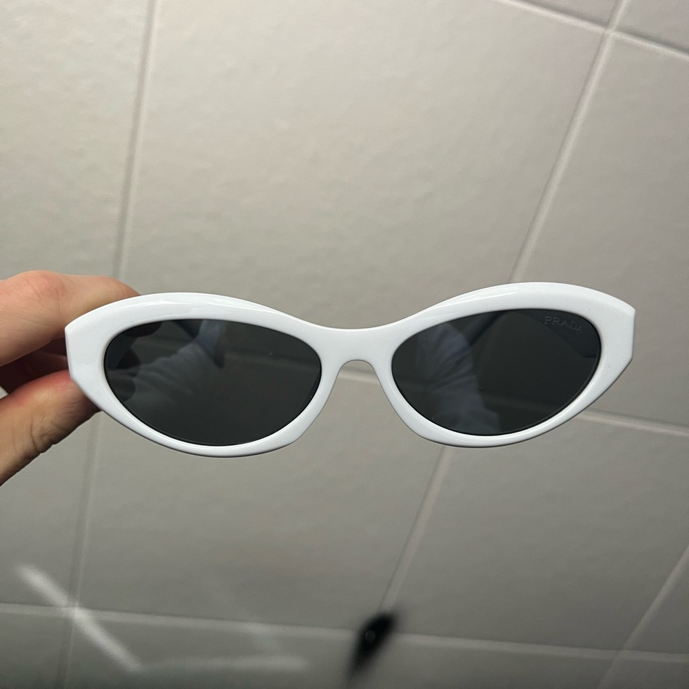 Womens rimmed sunglasses with charcoal lenses and silver detailing chrome shine